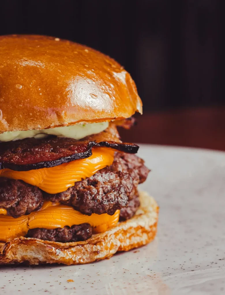 grilled handcrafted barbeque pork patty on side shot Abrahams Sausages  Meats Malaysia